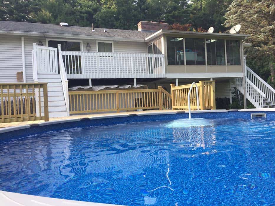 Multilevel deck and railings painted and stained in Hopkinton, MA.